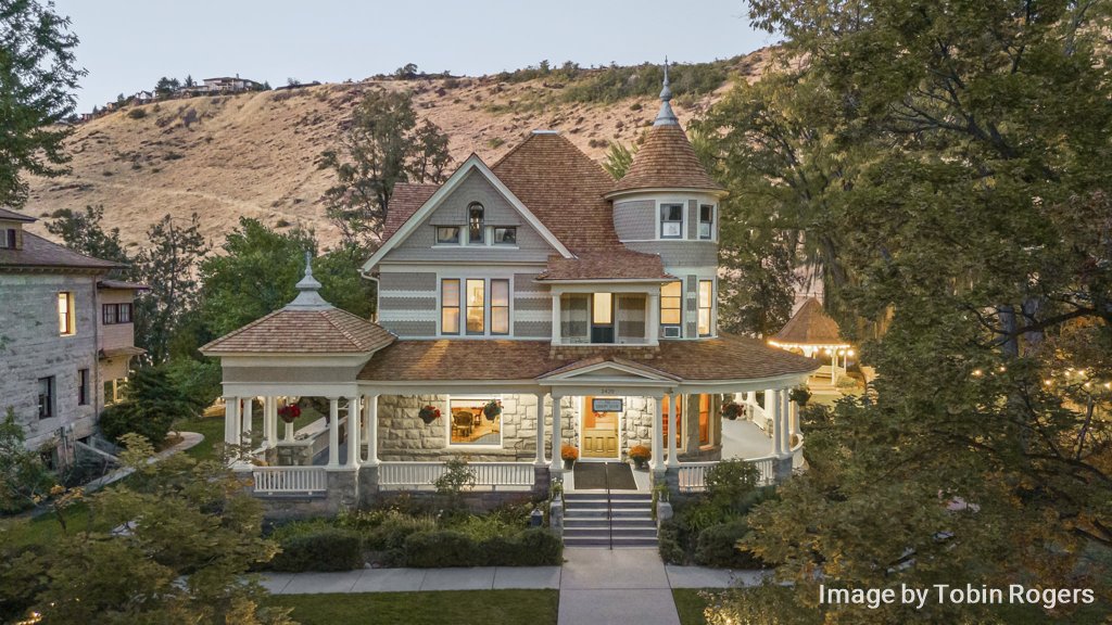 Elevated evening view of The Bishops' House framed by the foothills