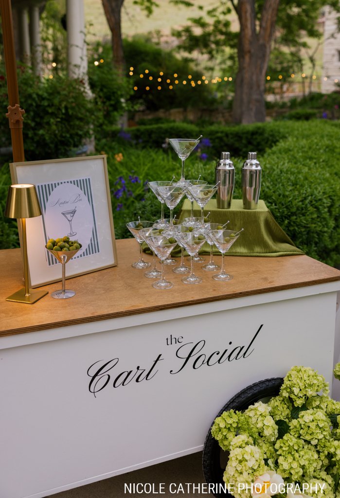 The Cart Social mobile bar set up with martini glasses for a reception