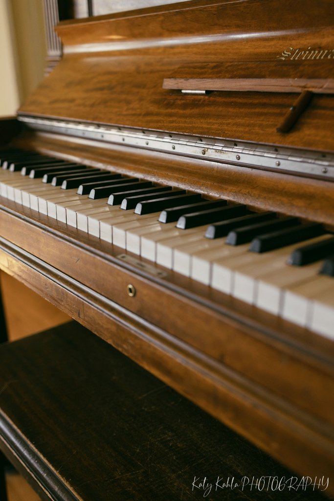 Close-up of antique piano keys